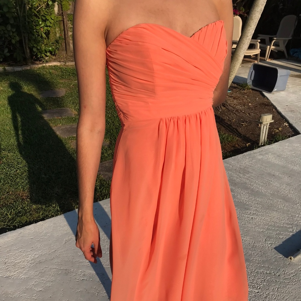 Peach knee length formal or semi-formal dress